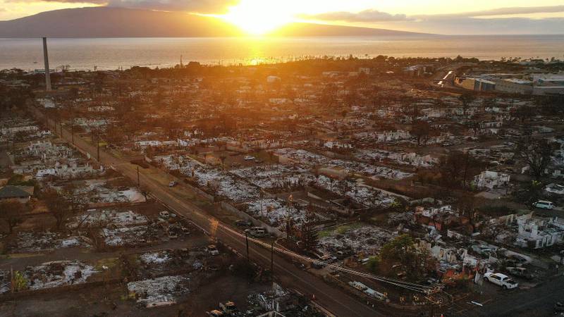 LAHAINA, HAWAII - OCTOBER 09: In an aerial view, burned structures and cars are seen two months after a devastating wildfire on October 09, 2023 in Lahaina, Hawaii. The wind-whipped wildfire on August 8th killed at least 98 people while displacing thousands more and destroying over 2,000 buildings in the historic town, most of which were homes. A phased reopening of tourist resort areas in west Maui began October 8th on the two-month anniversary of the deadliest wildfire in modern U.S. history. (Photo by Mario Tama/Getty Images)